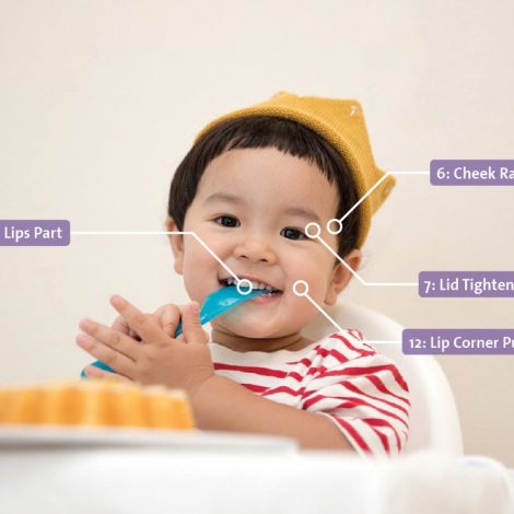 baby facereader asian boy yellow hat eating action units 1